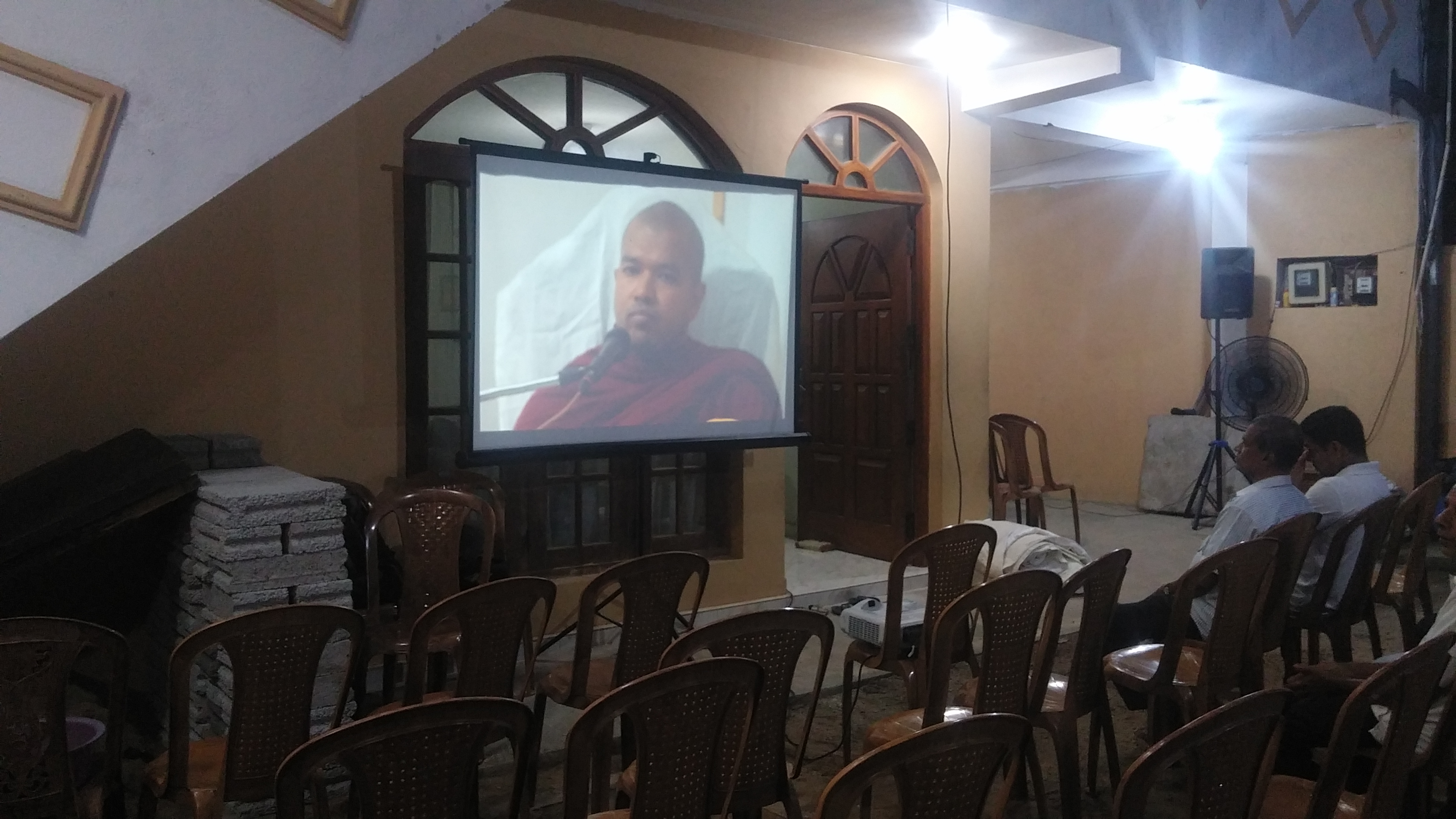 Generic Tripod 6 x 6 Ft 1:1 Projector Screen in action 2