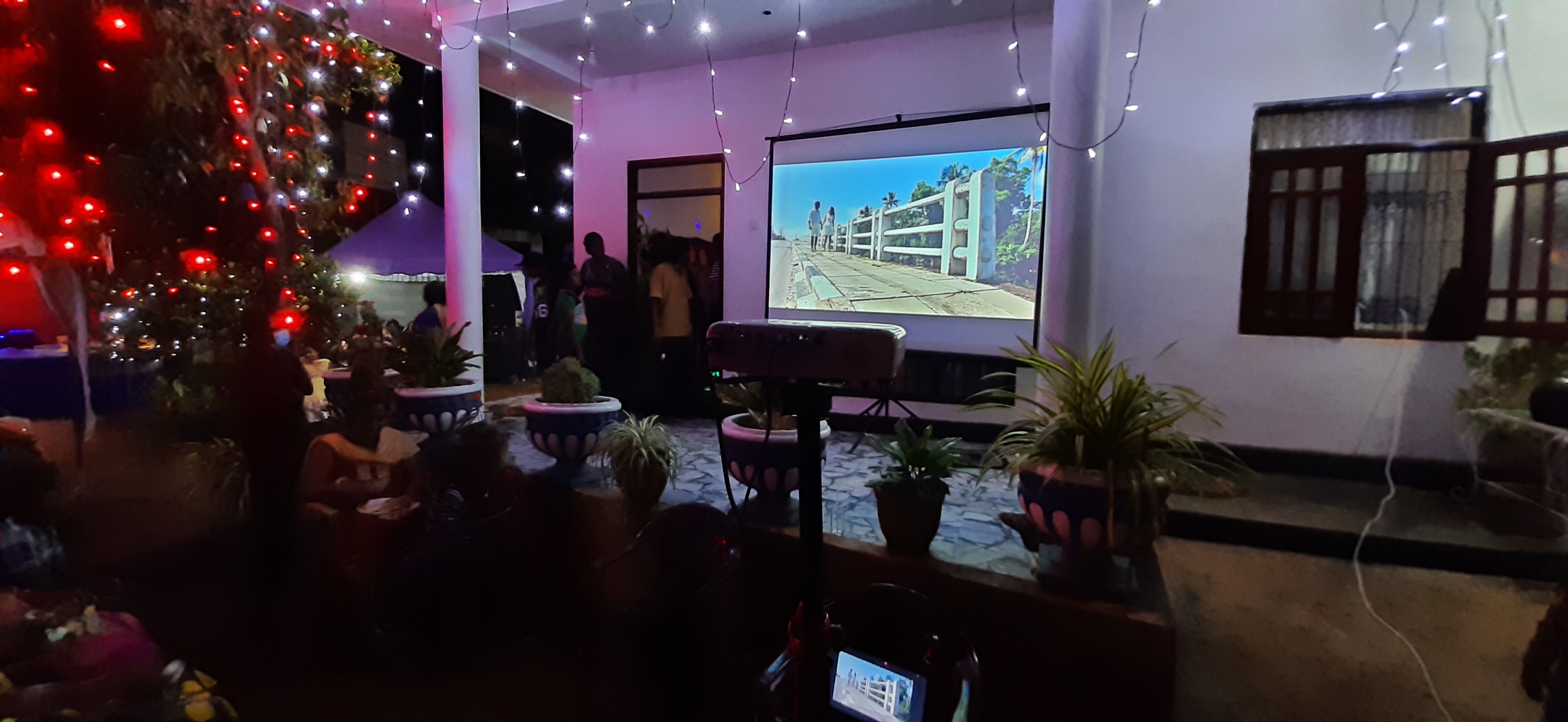 Generic Tripod 6 x 6 Ft 1:1 Projector Screen in action 8