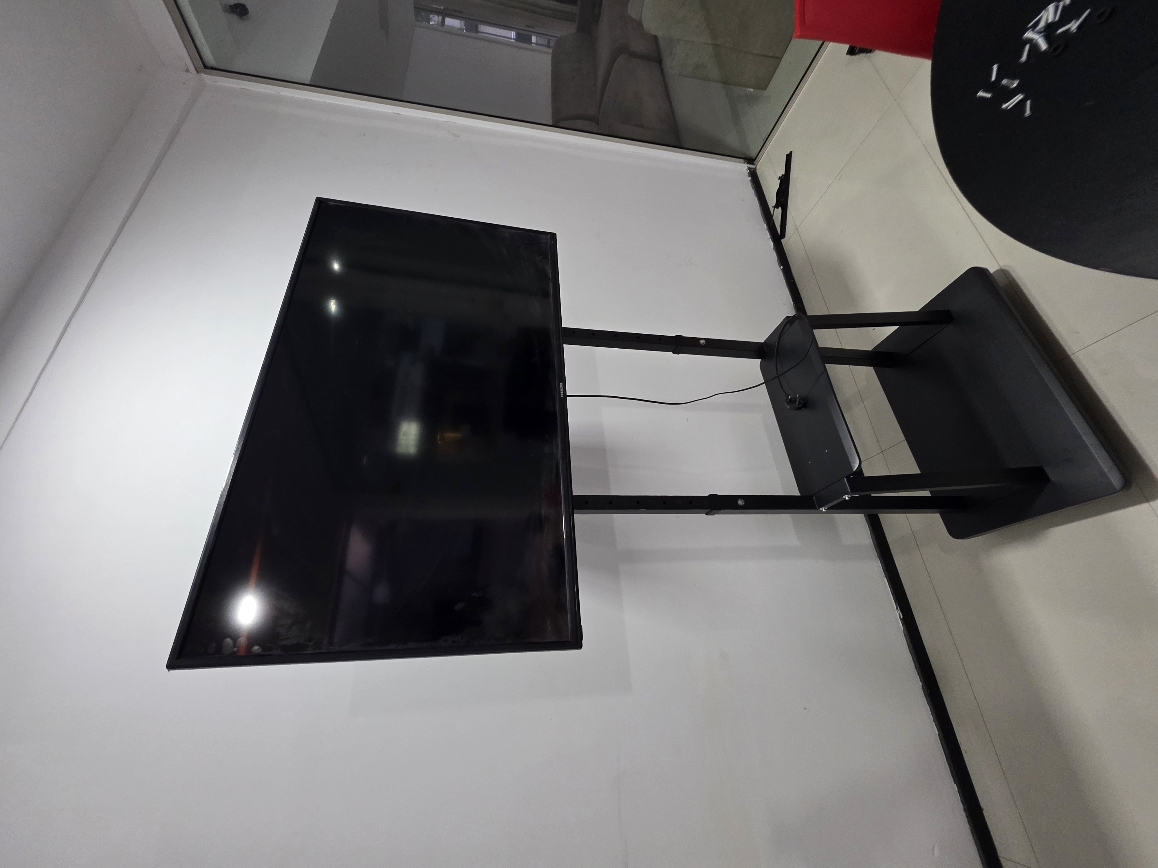 Trolly Movable Heavy Duty TV Stand 55"-75" Inch in action 1