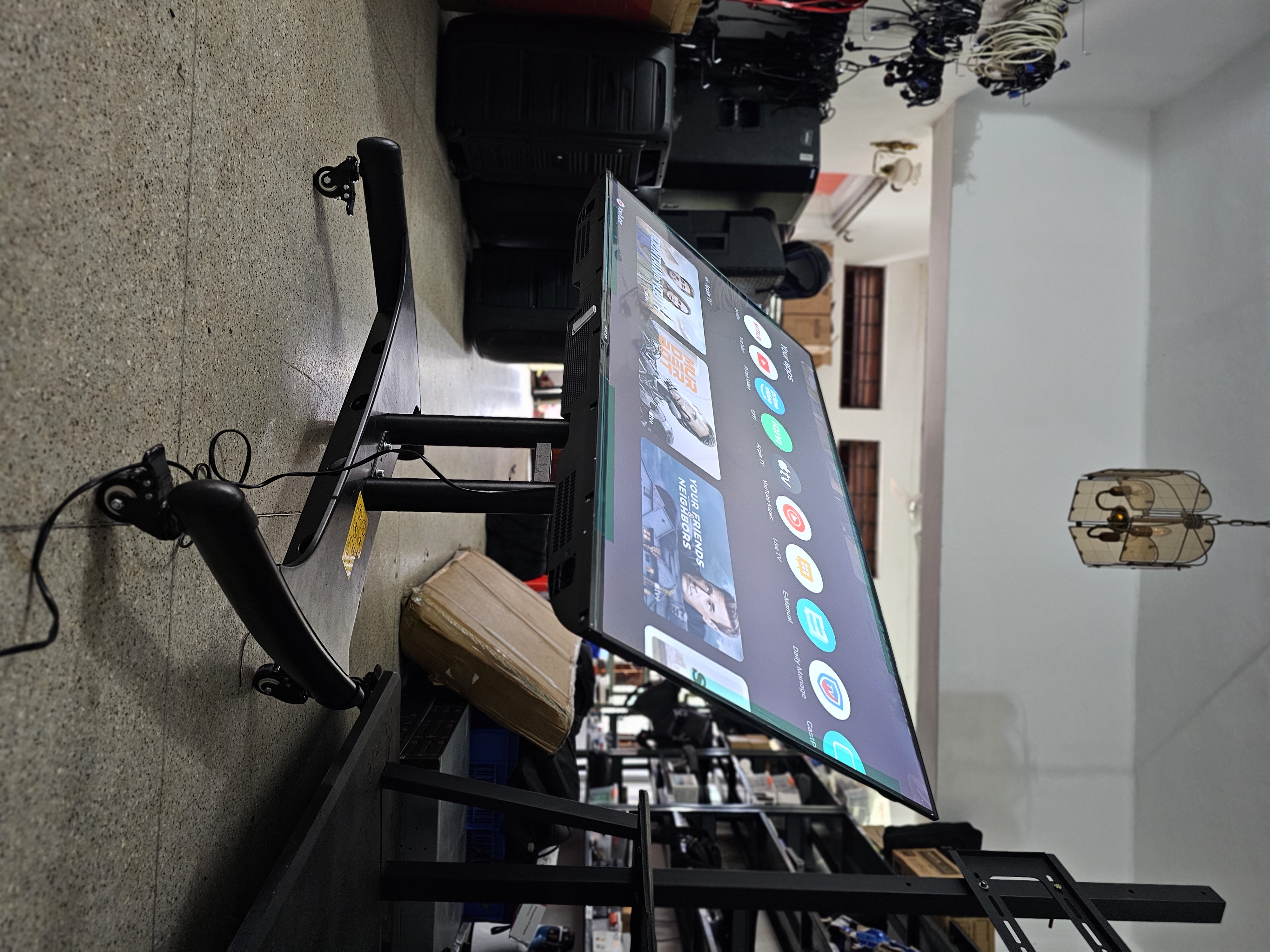 Trolly Movable Heavy Duty TV Stand 55"-75" Inch in action 3