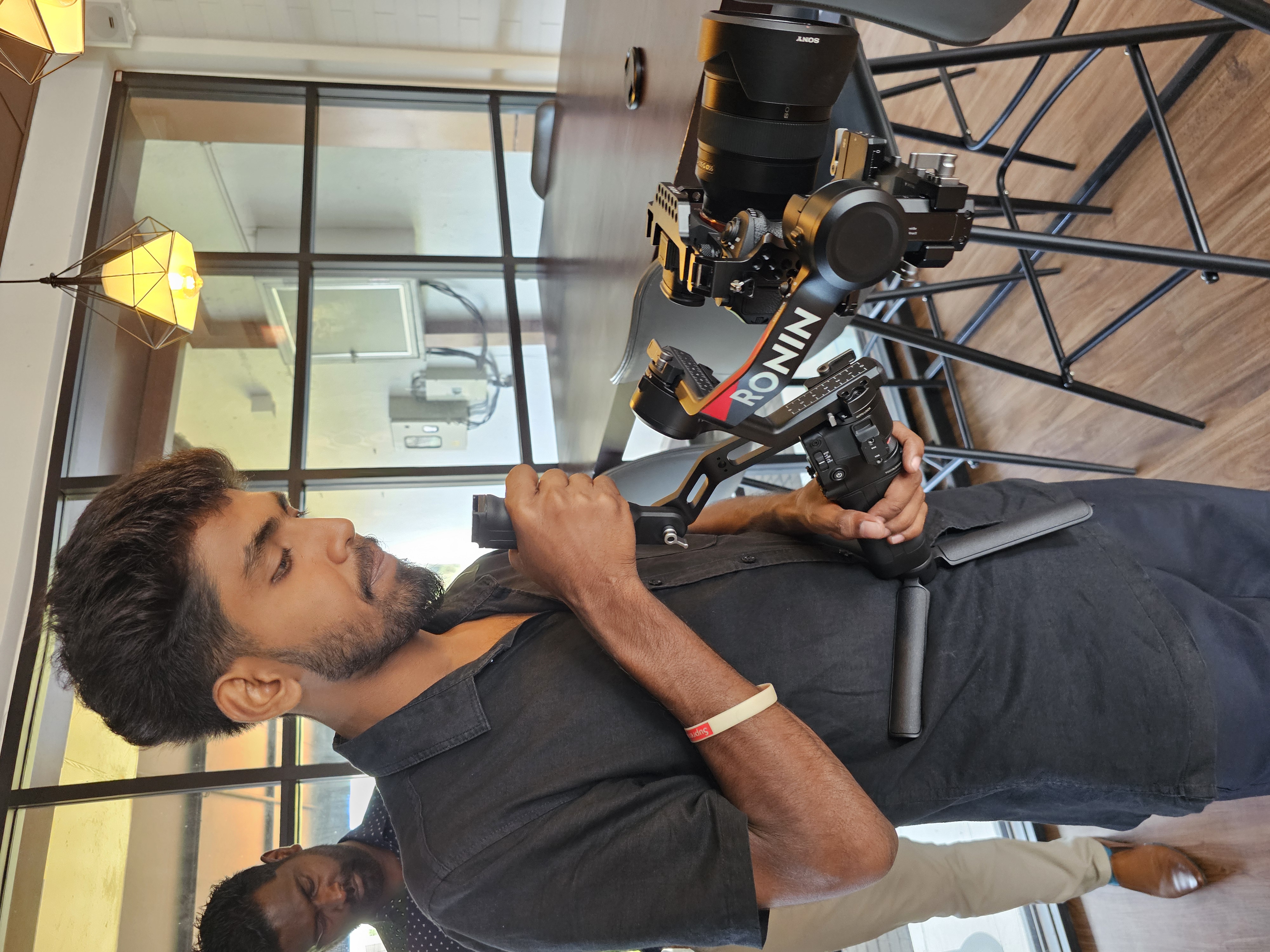 DJI RS 4 Camera Tripod in action 1
